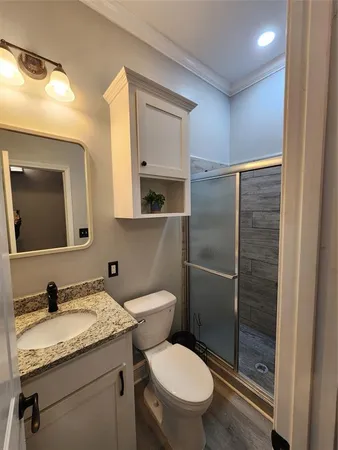 a bathroom with double sink and a mirror