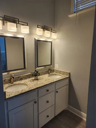 a bedroom with a bed and a table