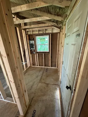 a house with trees in the background