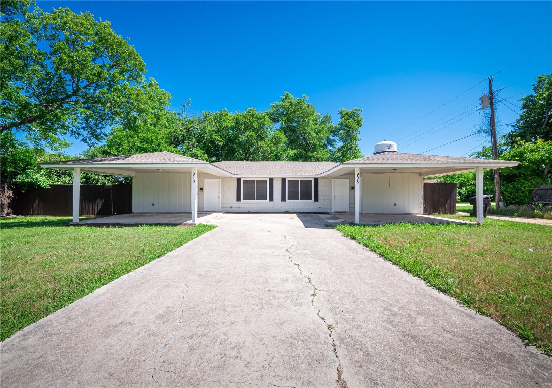 front view of a house and a yard
