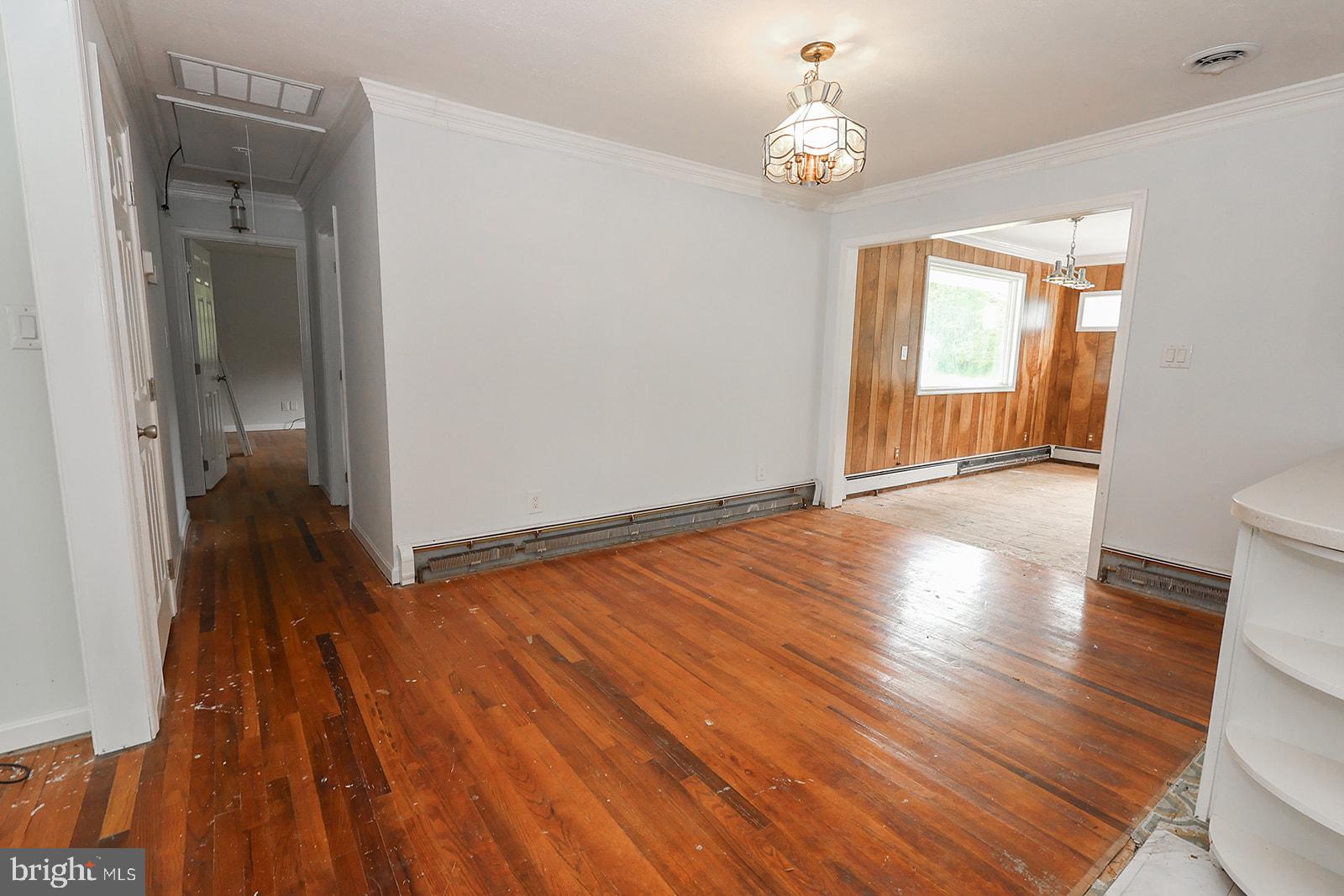 48146 Mallard View Lane St. Inigoes, MD 20684 - Photo 12 of 46 Spacious layout with warm wood floors.