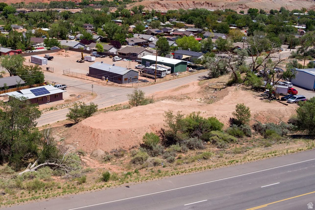 1261 North Highway 191 Moab, UT 84532 - Photo 1 of 5 Expansive undeveloped land parcel with direct paved road frontage