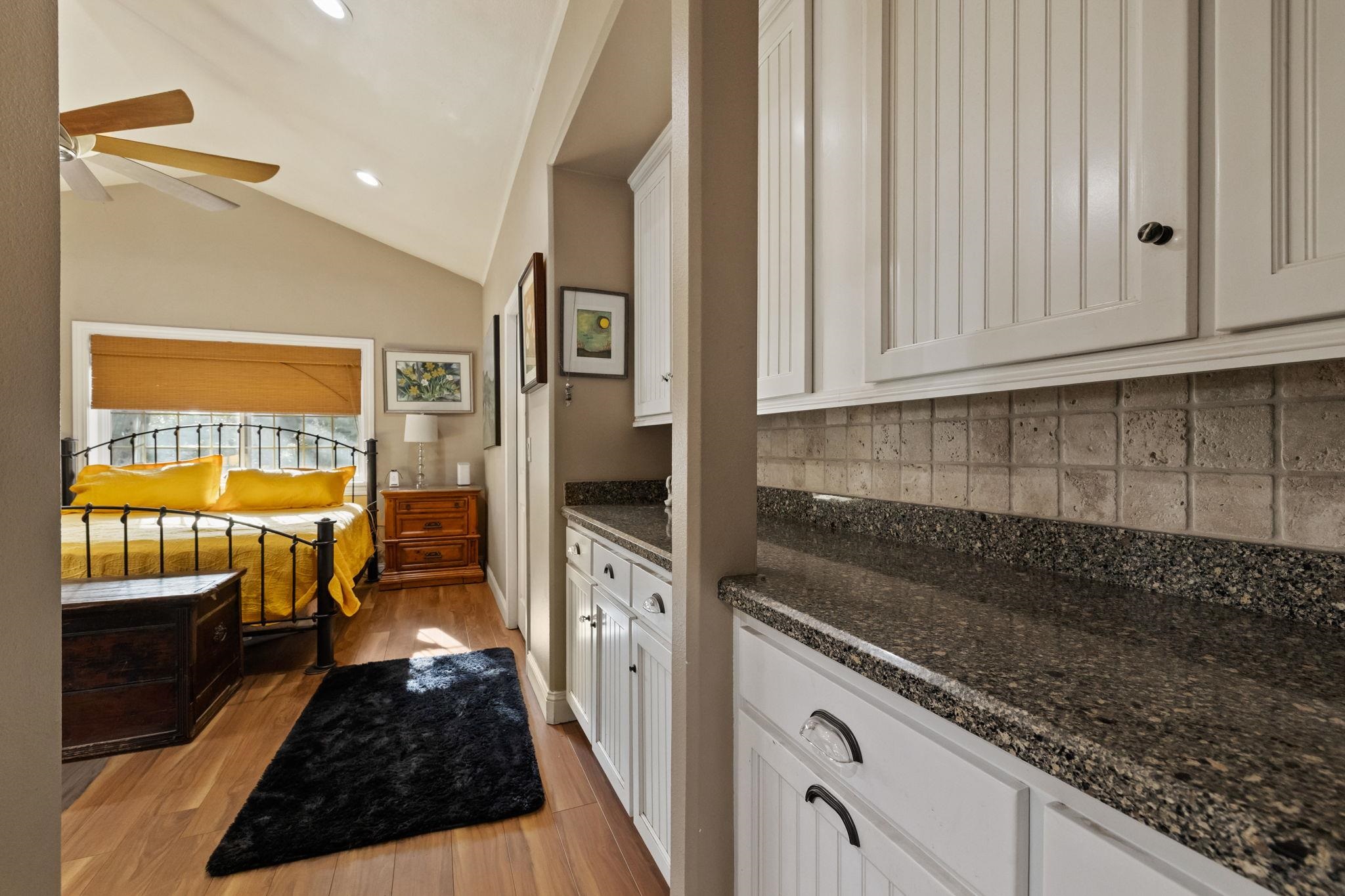 10177 Pulpit Rock Road Jamestown, CA 95327 - Photo 15 of 60 Bedroom featuring light wood finished floors, recessed lighting, lofted ceiling, and a ceiling fan