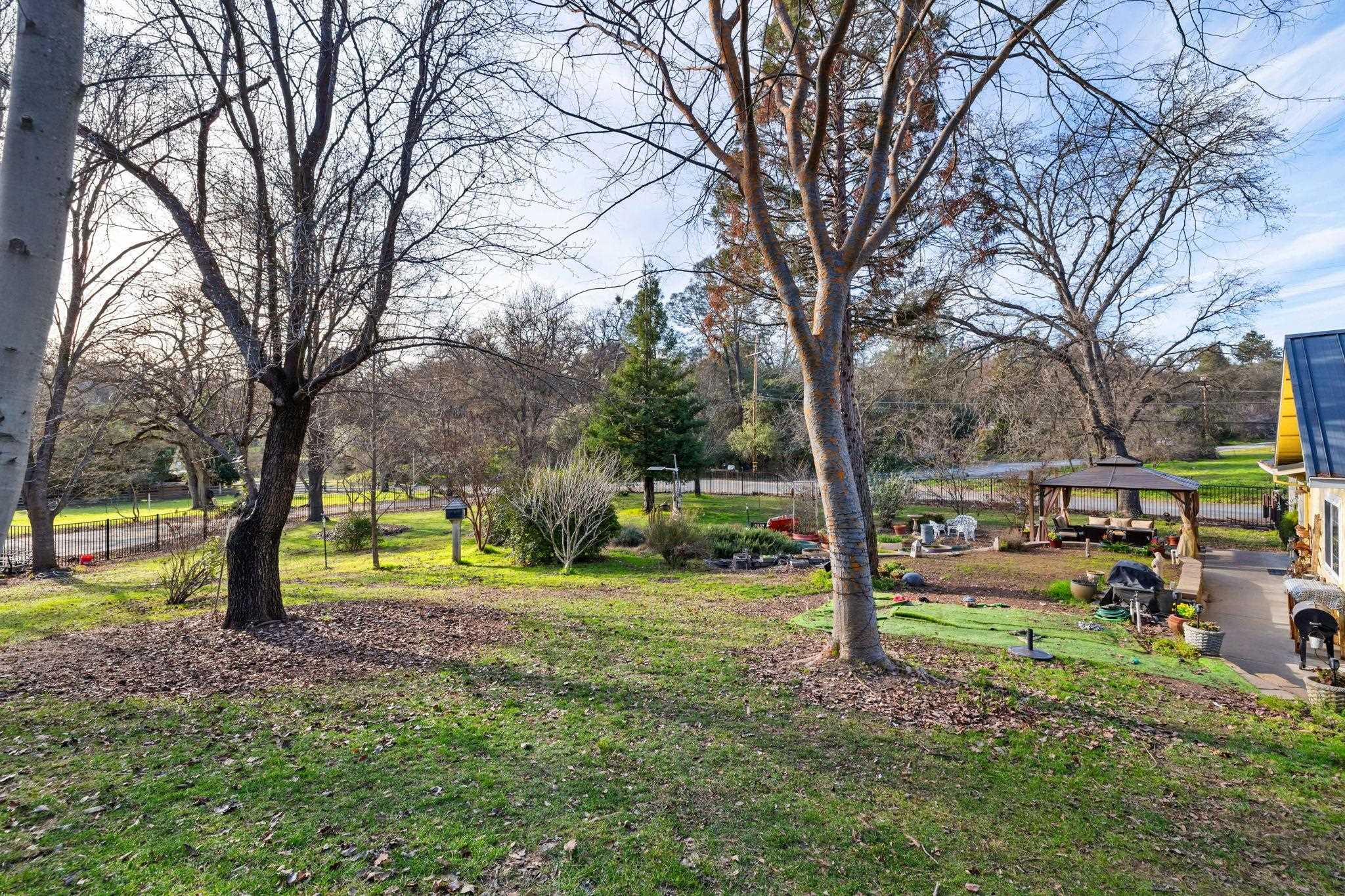 10177 Pulpit Rock Road Jamestown, CA 95327 - Photo 30 of 60 View of grassy yard featuring a gazebo and a patio