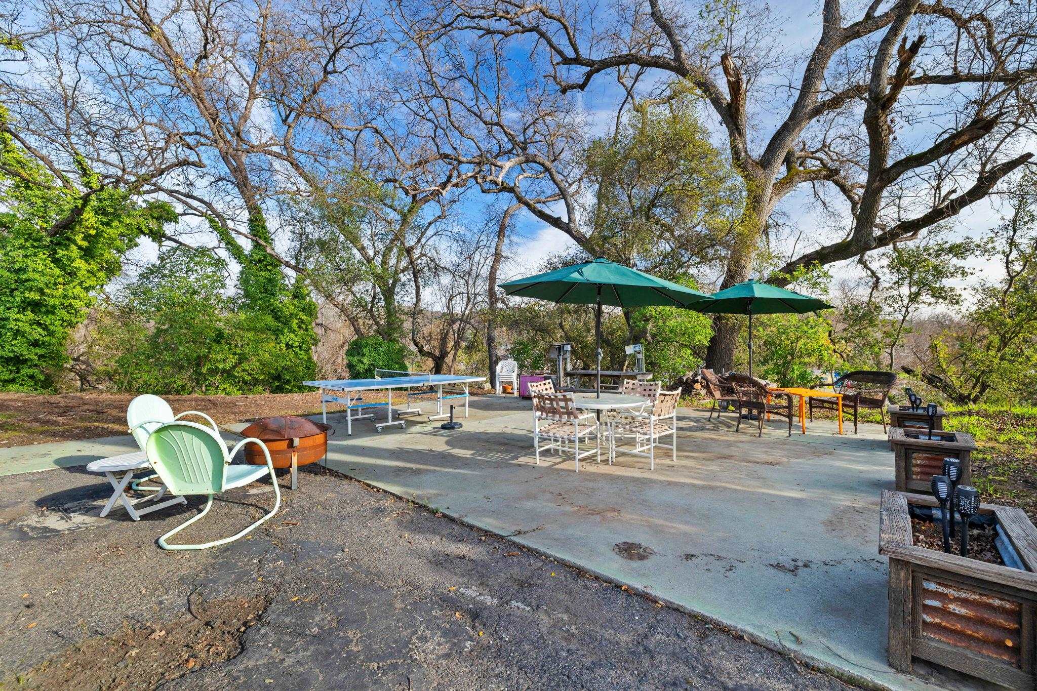 10177 Pulpit Rock Road Jamestown, CA 95327 - Photo 35 of 60 View of home's community featuring a patio and outdoor dining space