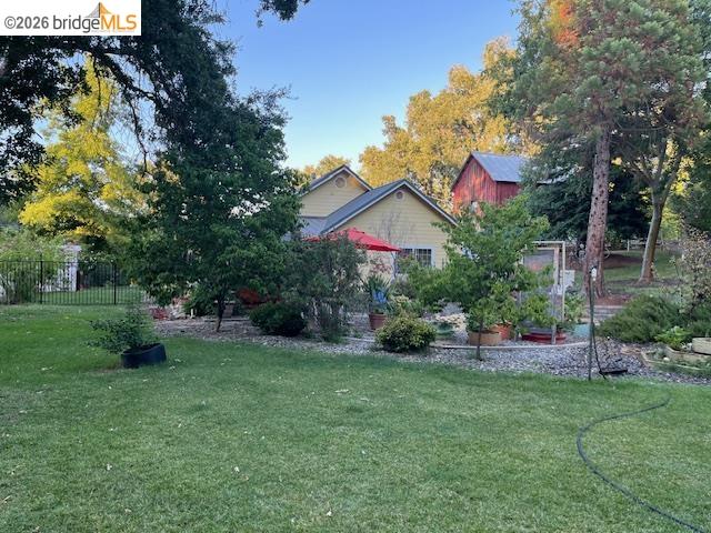 10177 Pulpit Rock Road Jamestown, CA 95327 - Photo 36 of 60 a front view of a house with a yard and tree s