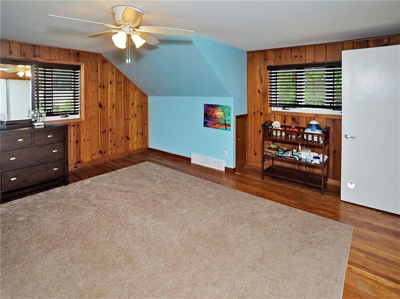 43 Holland Road Churchill, PA 15235 - Photo 19 of 25 Bedroom #2 upstairs. Hardwood floors, large room and custom blinds.