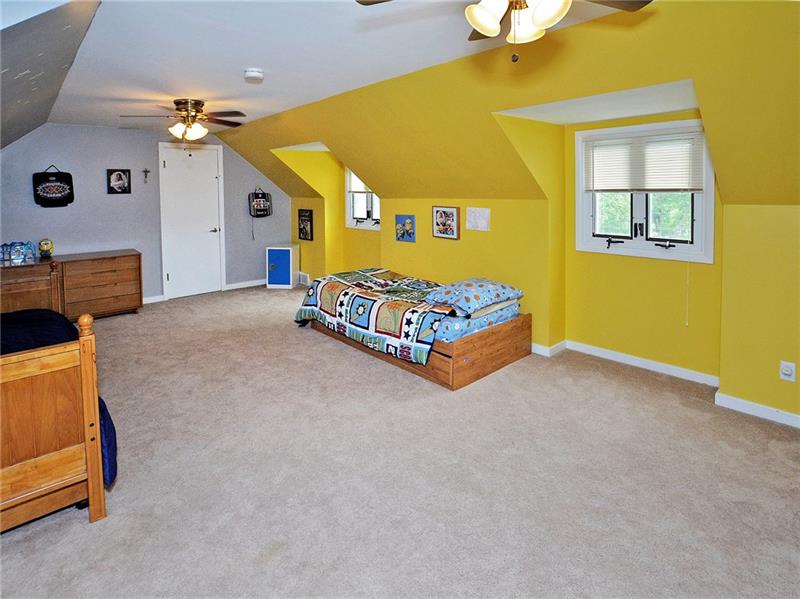 43 Holland Road Churchill, PA 15235 - Photo 20 of 25 Bedroom #3 upstairs. Very large area, lots of storage, custom blinds, and wall to wall carpeting.