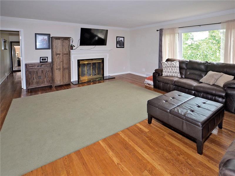 43 Holland Road Churchill, PA 15235 - Photo 9 of 25 Formal Living Room, 24 x 18. Gas fireplace, nice hardwood floors thru out.