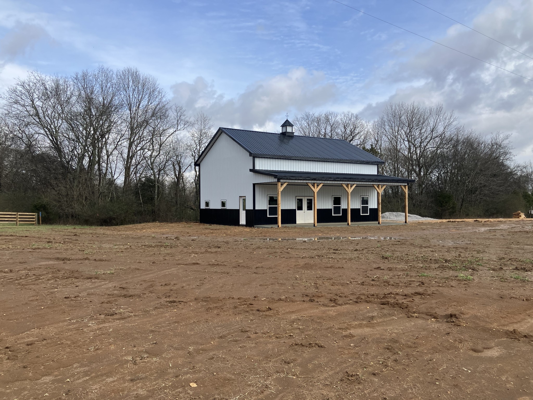 3333 Booker Ridge Road Mount Pleasant, TN 38474 - Photo 2 of 43 a front view of a house with a yard