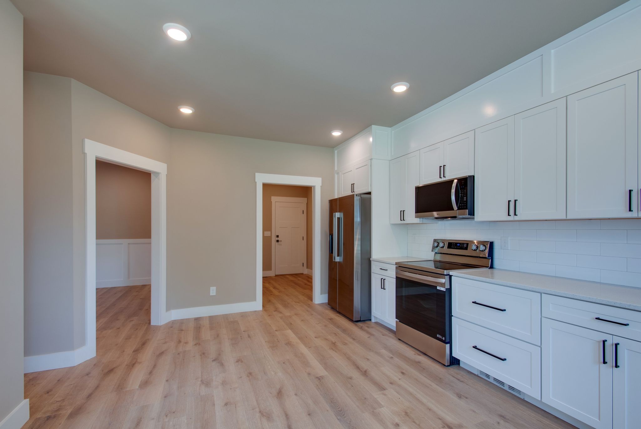 3333 Booker Ridge Road Mount Pleasant, TN 38474 - Photo 22 of 43 a kitchen with stainless steel appliances a refrigerator stove and sink