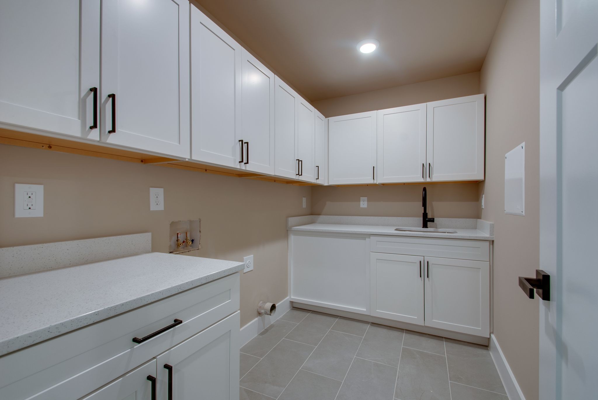 3333 Booker Ridge Road Mount Pleasant, TN 38474 - Photo 30 of 43 a kitchen with a sink and cabinets