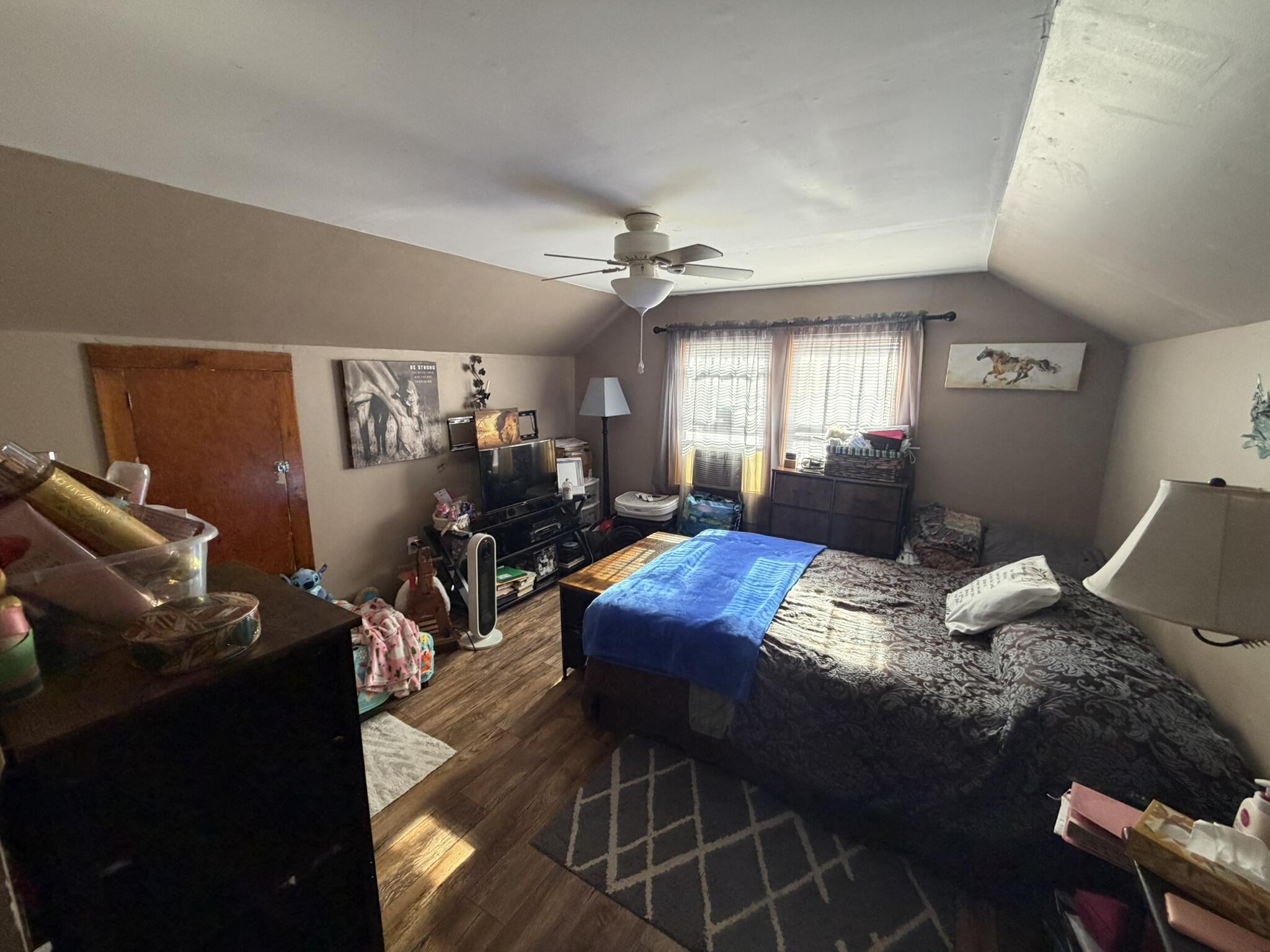 91 Quinton Callahan Road Booneville, KY 41314 - Photo 19 of 39 Upstairs bedroom offering comfortable space and natural lighting!