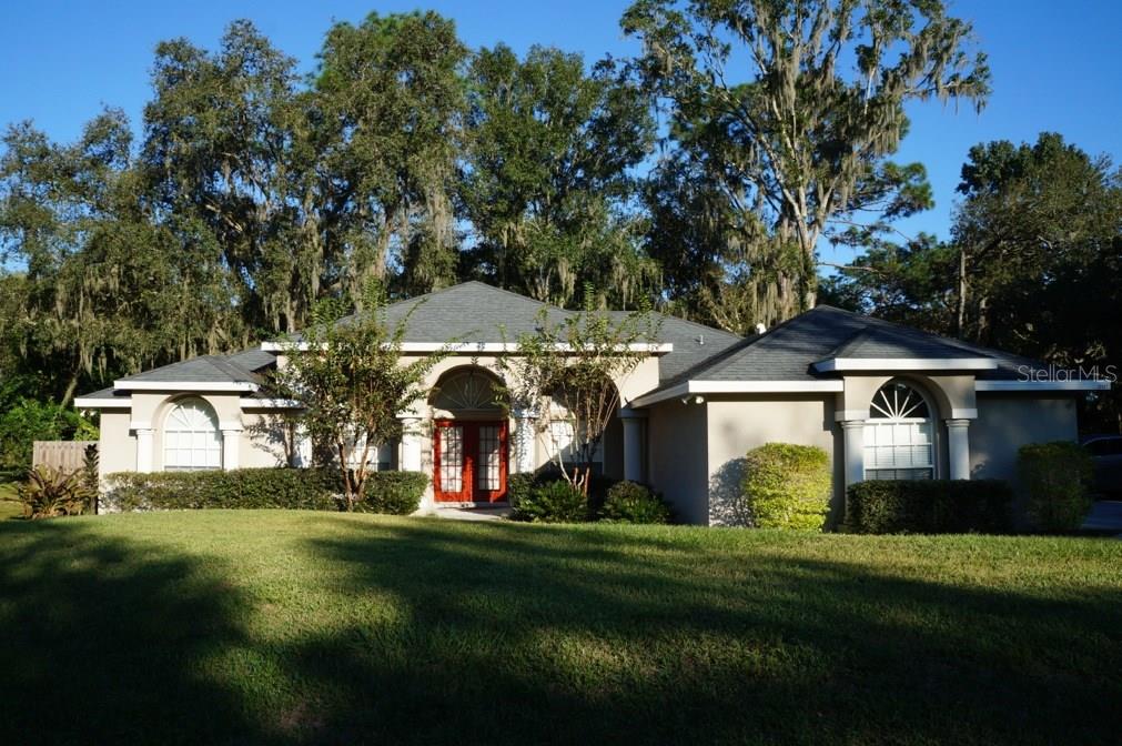 20907 Ragan Lane Land O' Lakes, FL 34638 - Photo 1 of 1 Front of Home with side load 2 car garage
