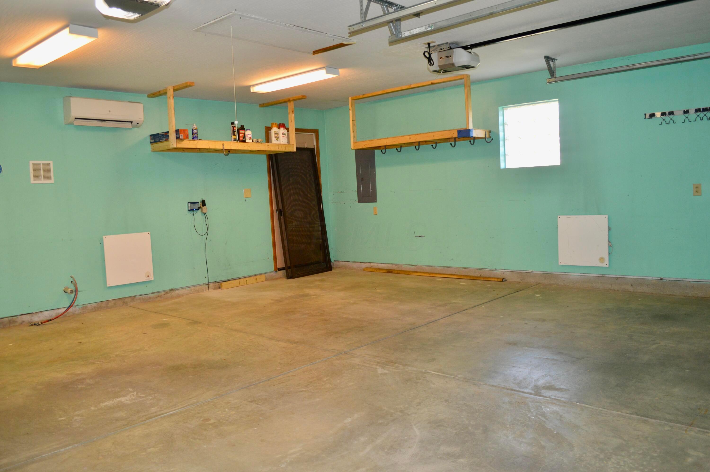 85 Barry Road Southwest Pataskala, OH 43068 - Photo 26 of 30 There's even an Electric Heat and Air Conditioning Unit!