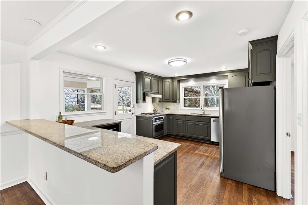 632 Willivee Drive Decatur, GA 30033 - Photo 13 of 44 a kitchen with sink and refrigerator