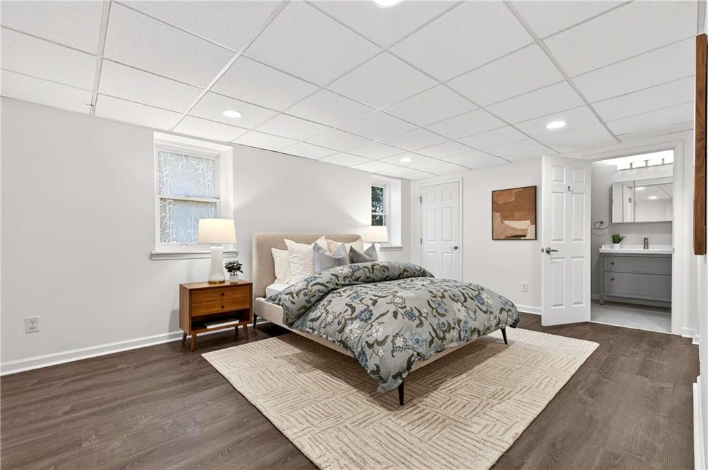 632 Willivee Drive Decatur, GA 30033 - Photo 28 of 44 a bedroom with a bed and wooden floor