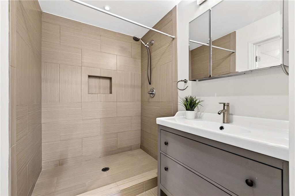 632 Willivee Drive Decatur, GA 30033 - Photo 29 of 44 a bathroom with a shower and a sink