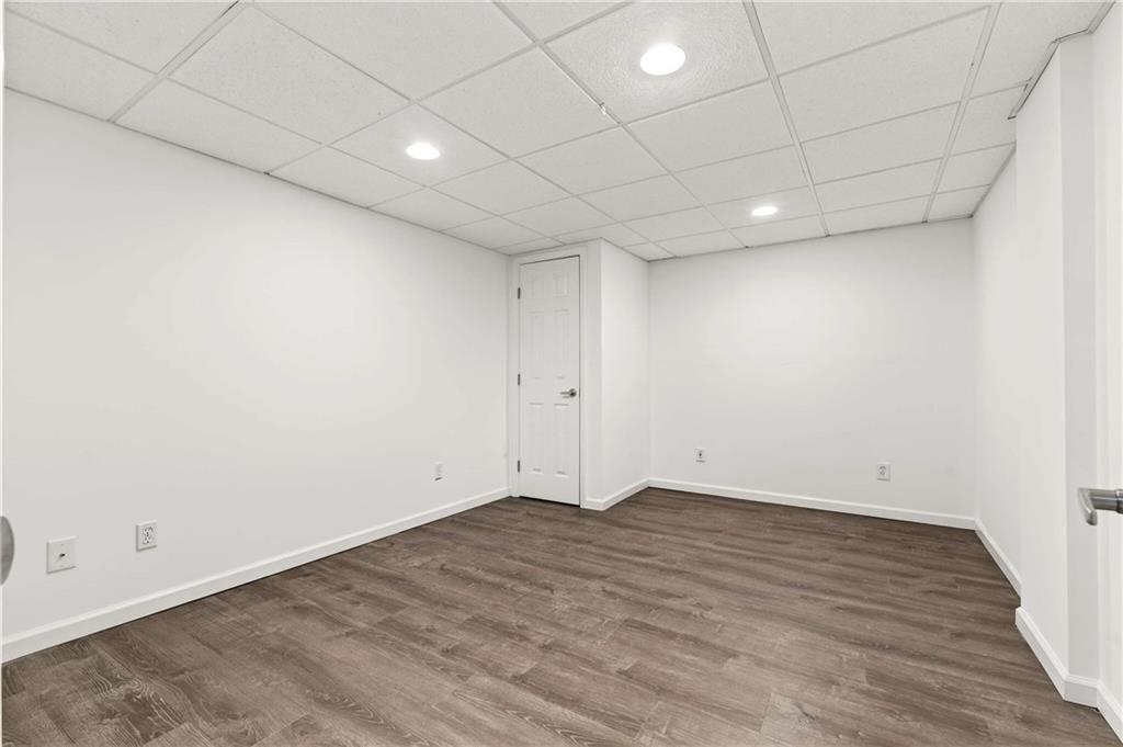 632 Willivee Drive Decatur, GA 30033 - Photo 32 of 44 an empty room with wooden floor