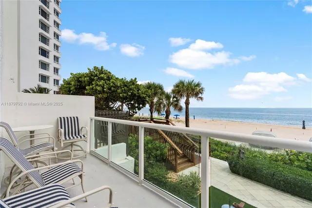 a view of balcony with furniture