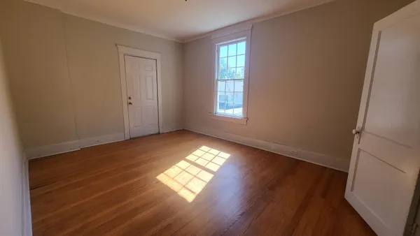 a view of an empty room and window