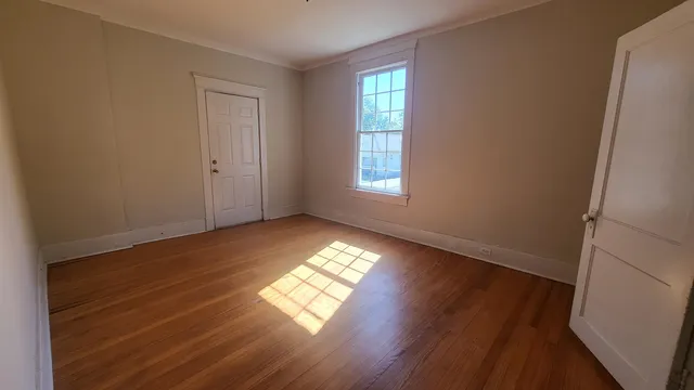 a view of an empty room and window