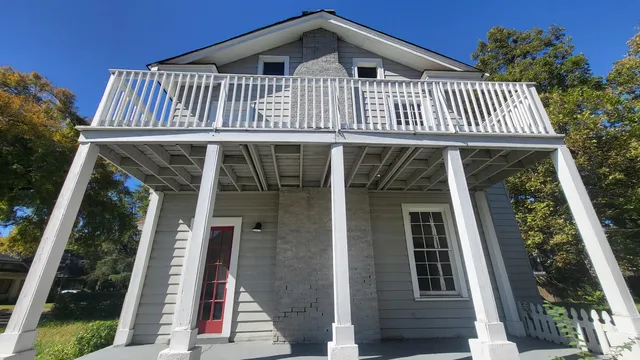 a front view of a house with a porch