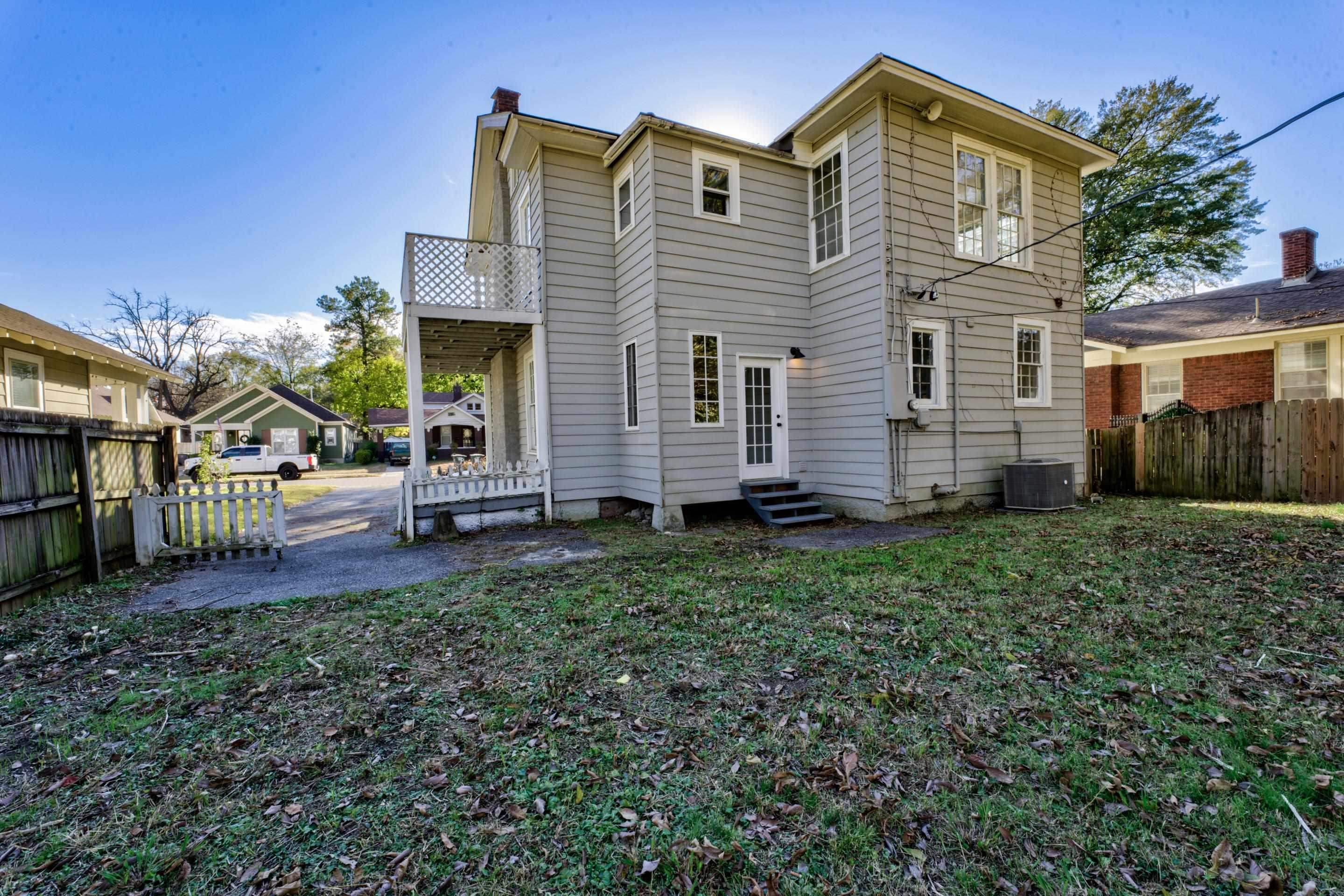 1844 Oliver Avenue Memphis, TN 38114 - Photo 6 of 18 a view of a house with a yard