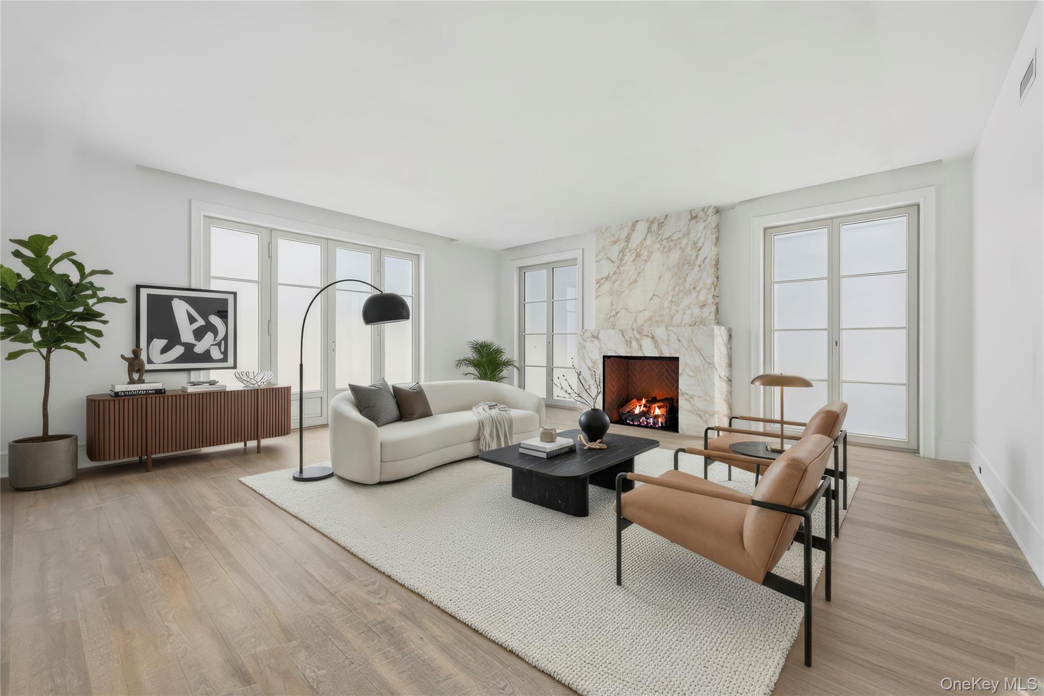 156 Harborview South Lawrence, NY 11559 - Photo 8 of 26 a living room with furniture and a fireplace