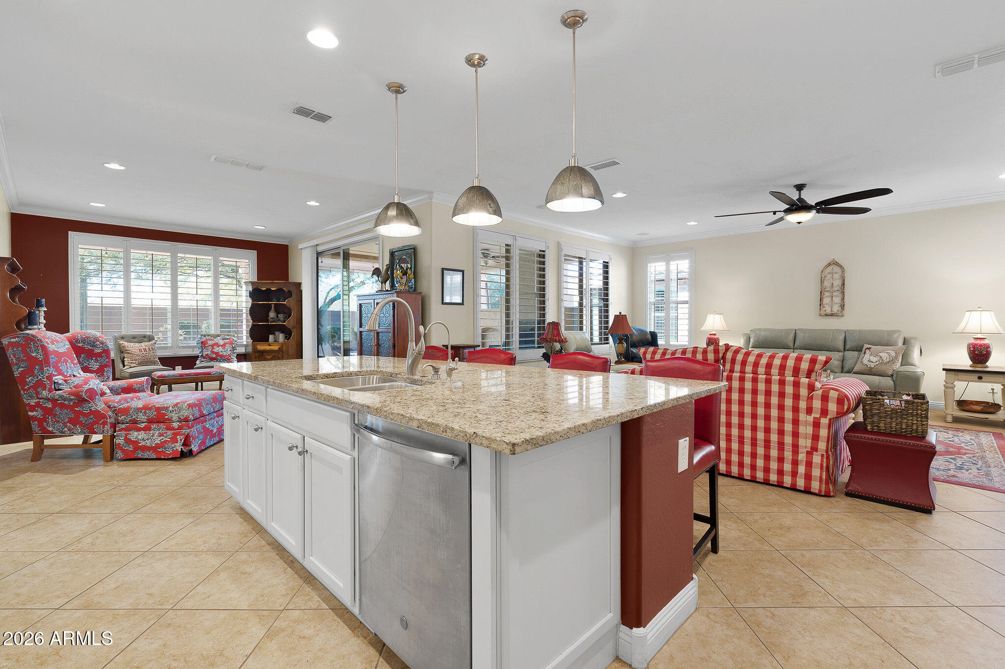 7337 West Silver Spring Way Florence, AZ 85132 - Photo 28 of 60 a large kitchen with a large counter top space and living room
