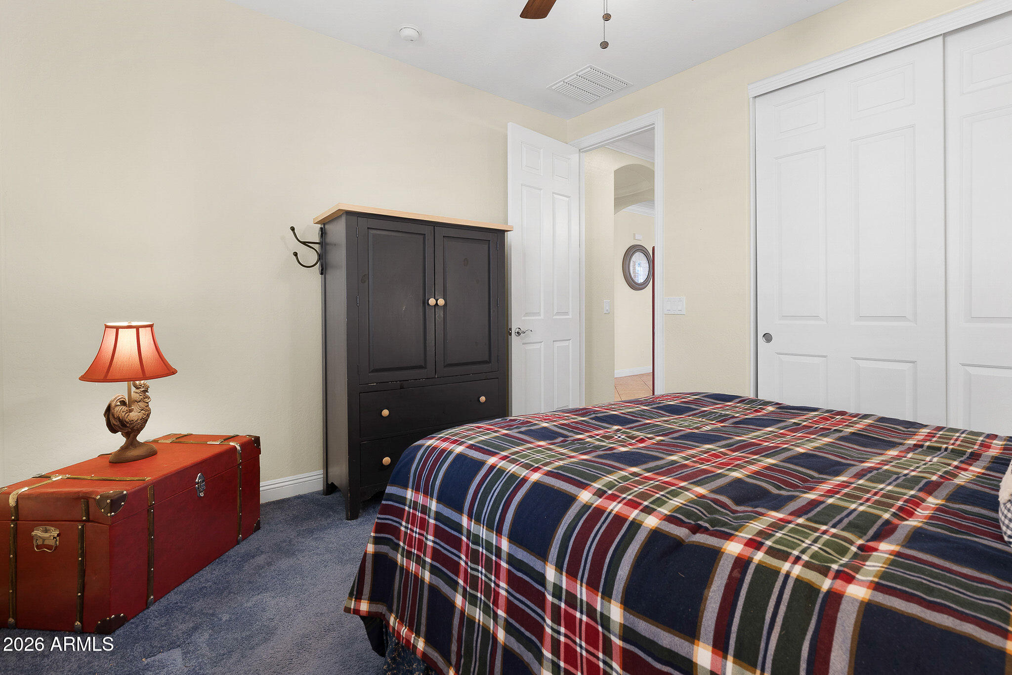 7337 West Silver Spring Way Florence, AZ 85132 - Photo 33 of 60 a bedroom with a bed and a window