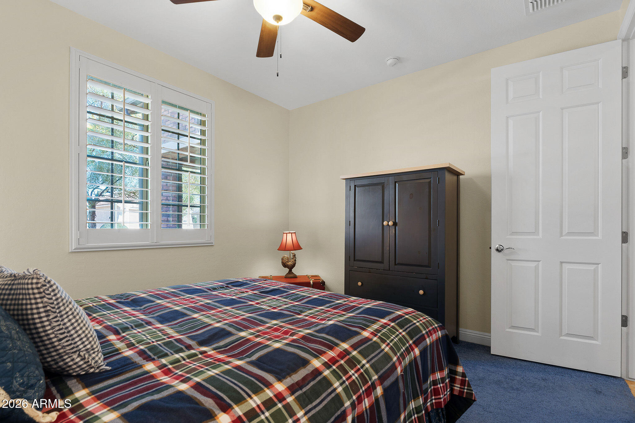 7337 West Silver Spring Way Florence, AZ 85132 - Photo 34 of 60 a bedroom with a bed and a window