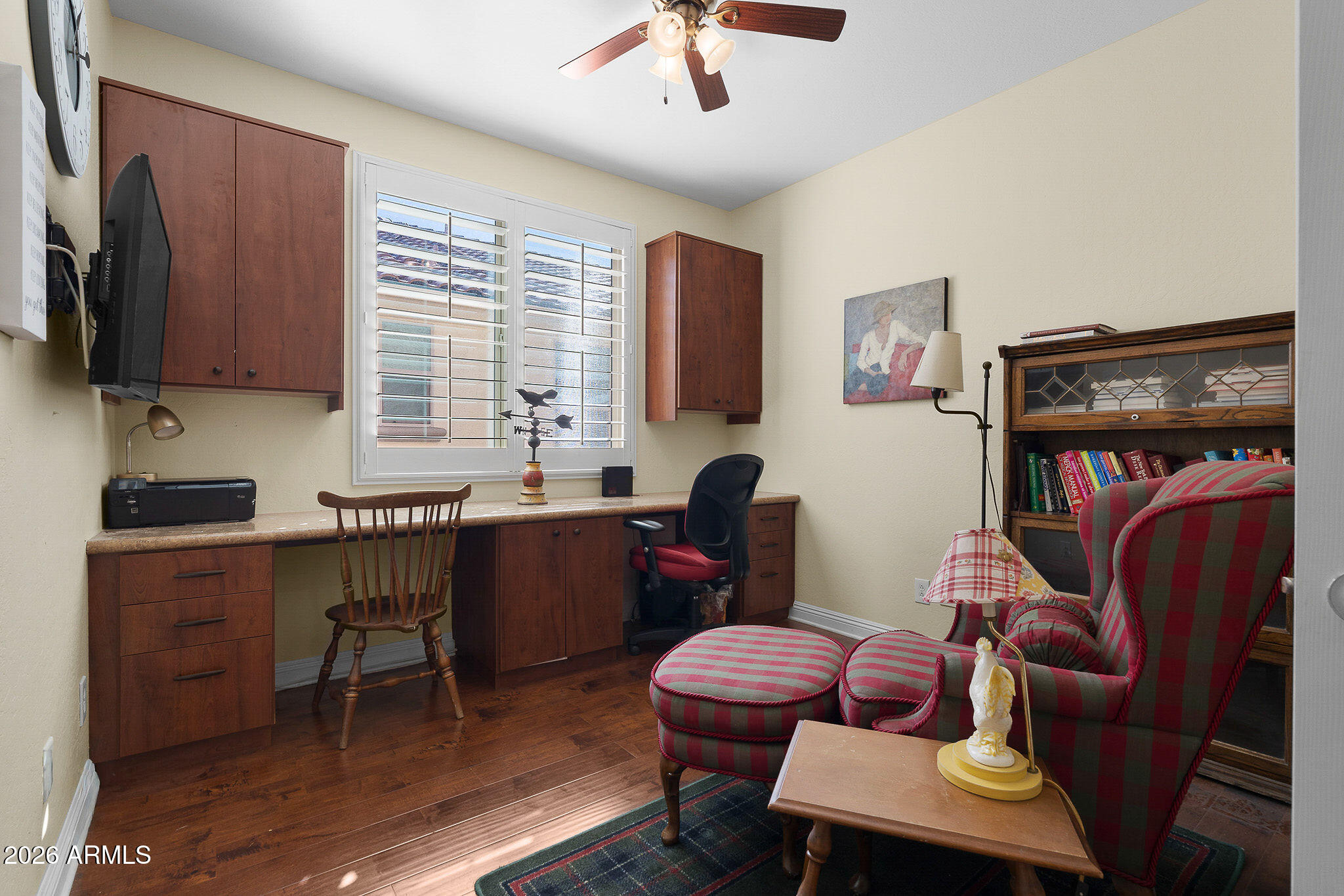 7337 West Silver Spring Way Florence, AZ 85132 - Photo 37 of 60 a reading room with furniture a window and a flat screen tv