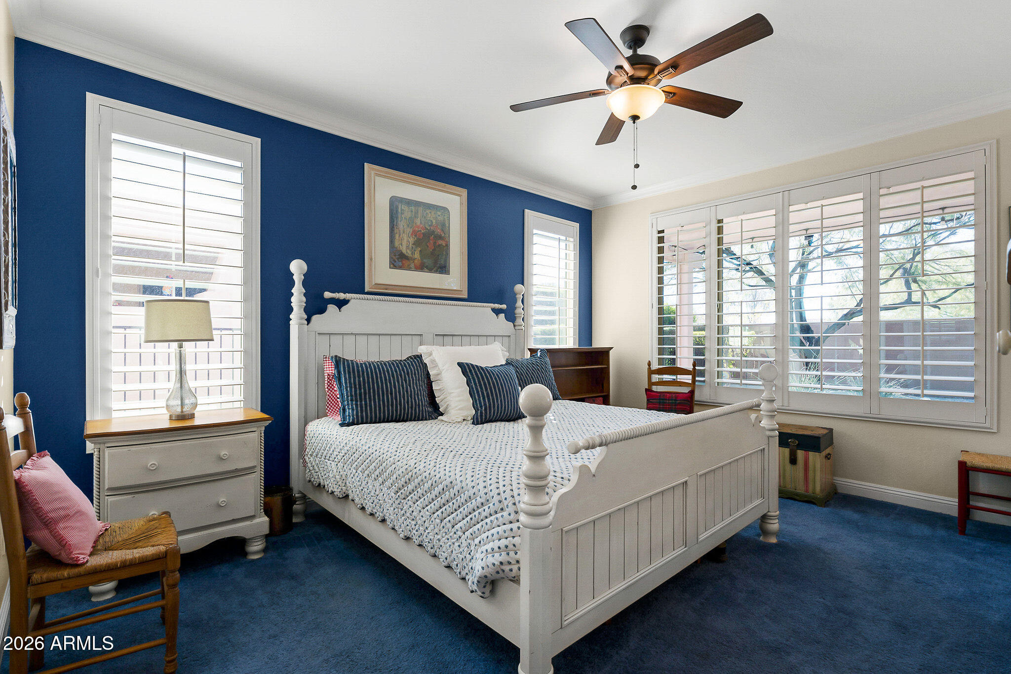 7337 West Silver Spring Way Florence, AZ 85132 - Photo 40 of 60 a bedroom with a bed and a window