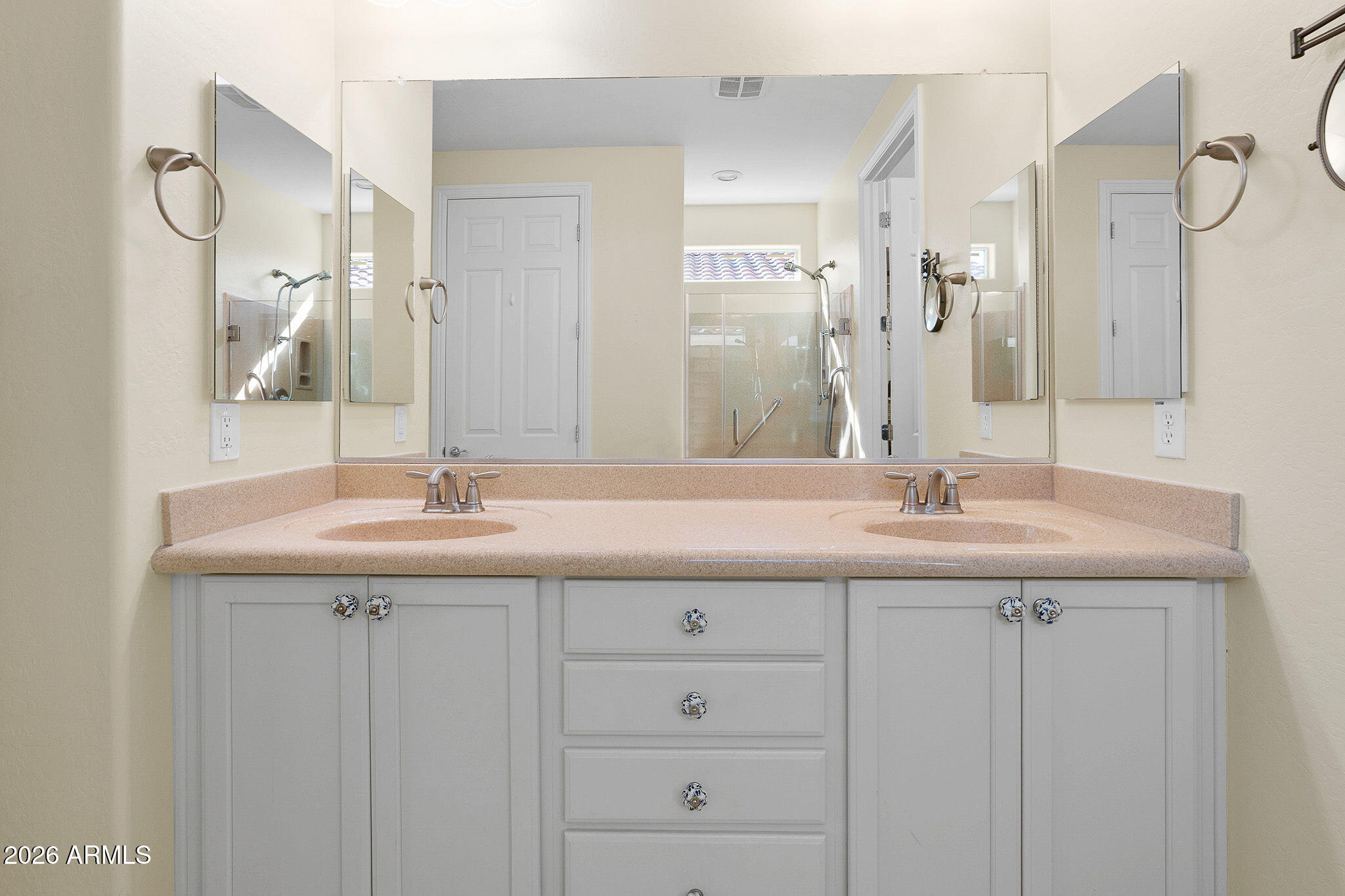 7337 West Silver Spring Way Florence, AZ 85132 - Photo 46 of 60 a bathroom with a sink and a mirror
