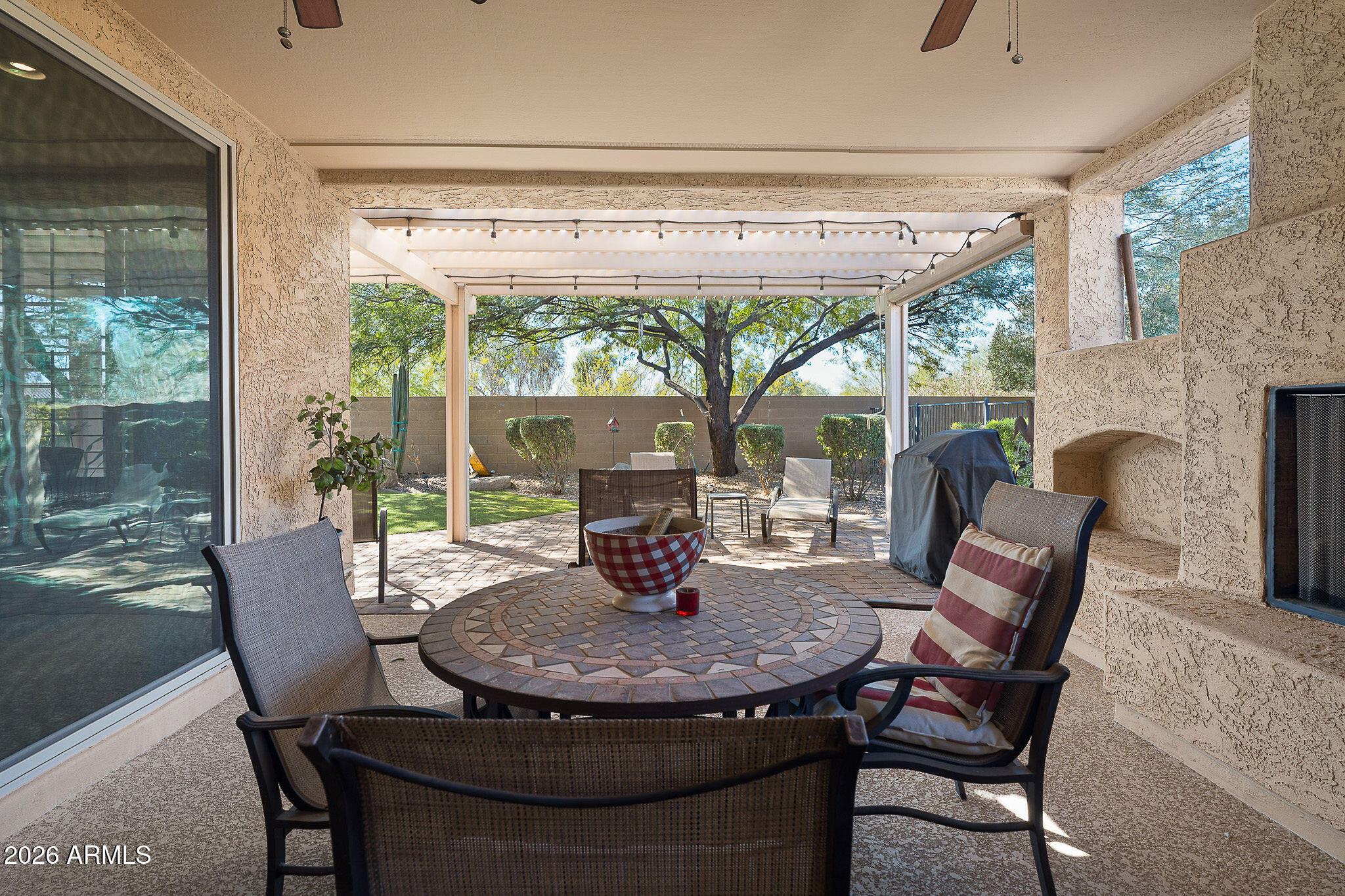 7337 West Silver Spring Way Florence, AZ 85132 - Photo 52 of 60 a view of a dining room with furniture window and outside view