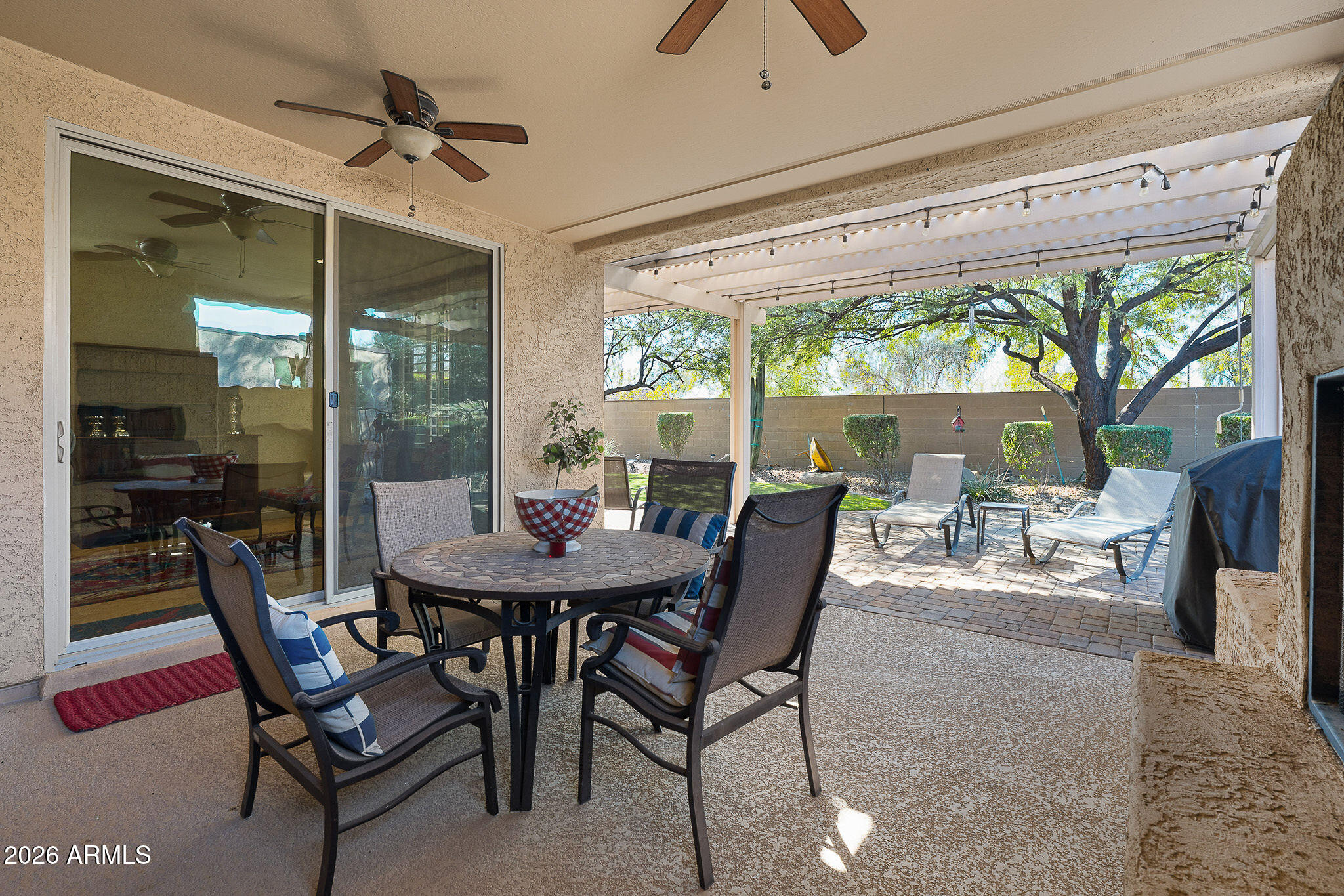 7337 West Silver Spring Way Florence, AZ 85132 - Photo 53 of 60 a view of a dining room with furniture window and outside view