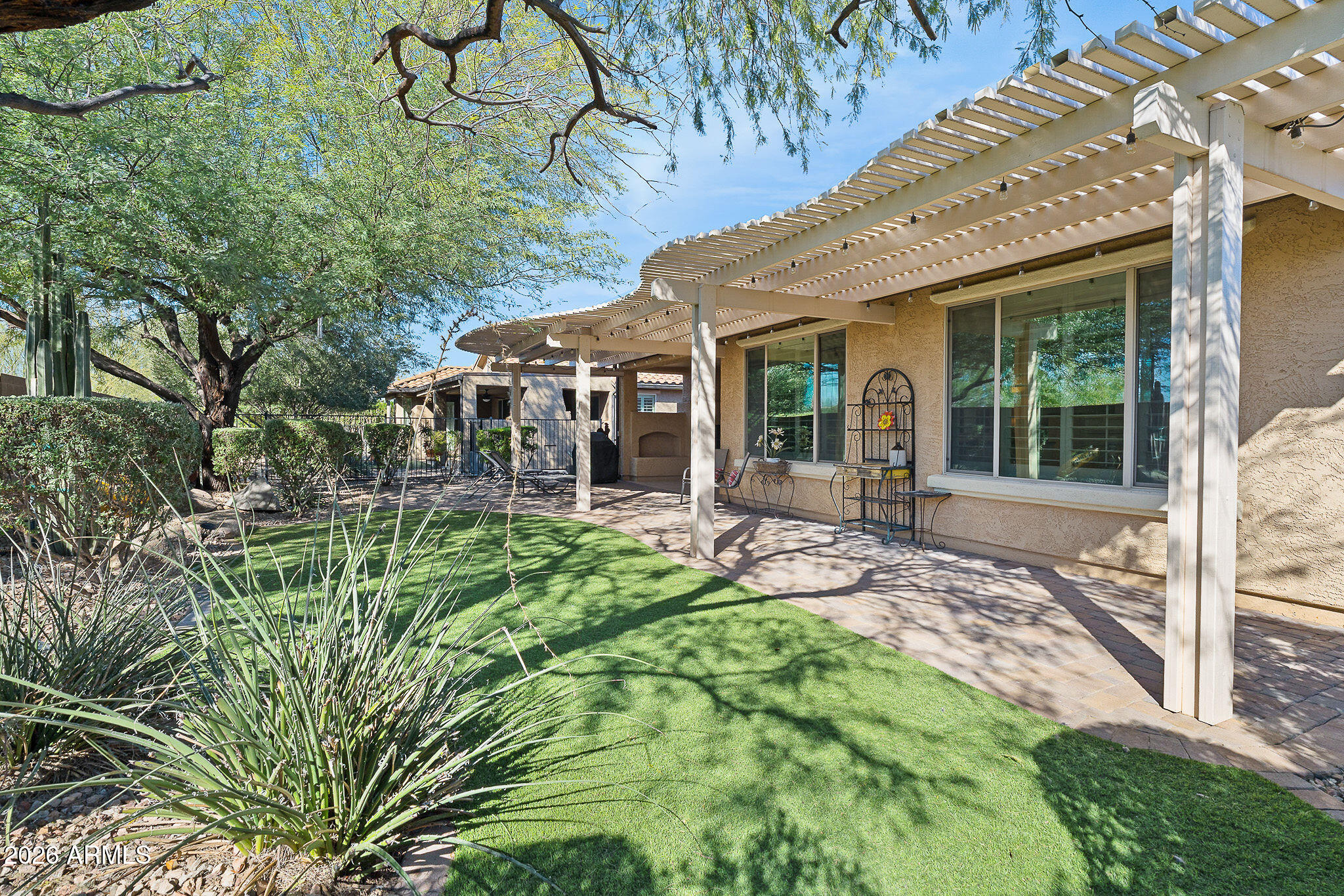 7337 West Silver Spring Way Florence, AZ 85132 - Photo 55 of 60 a view of a house with backyard and porch