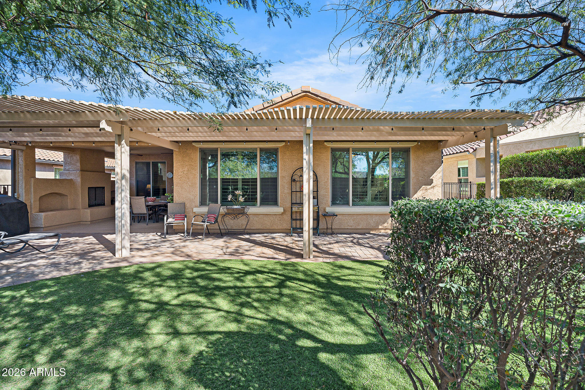 7337 West Silver Spring Way Florence, AZ 85132 - Photo 56 of 60 front view of a house with a yard