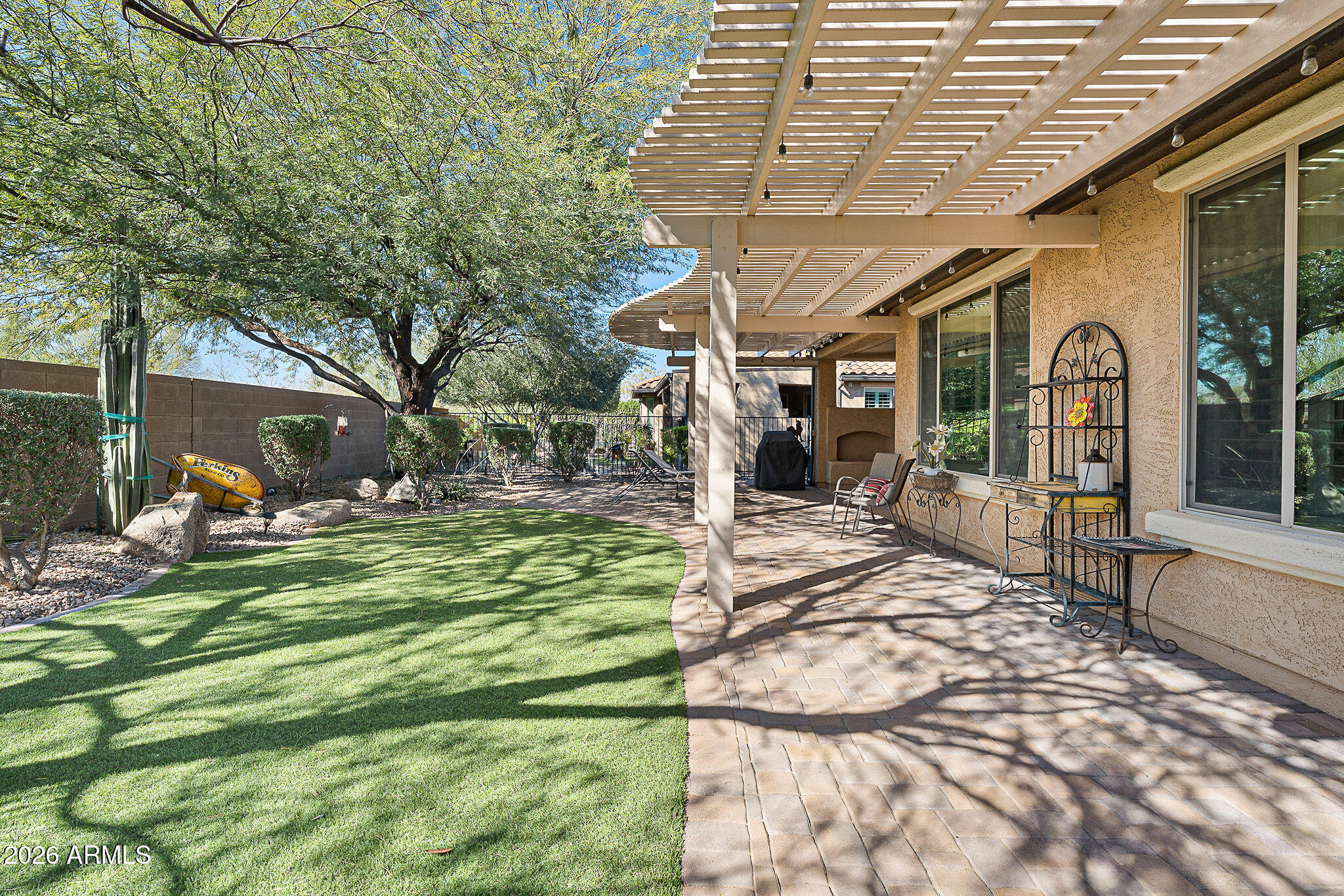 7337 West Silver Spring Way Florence, AZ 85132 - Photo 59 of 60 a view of a house with backyard