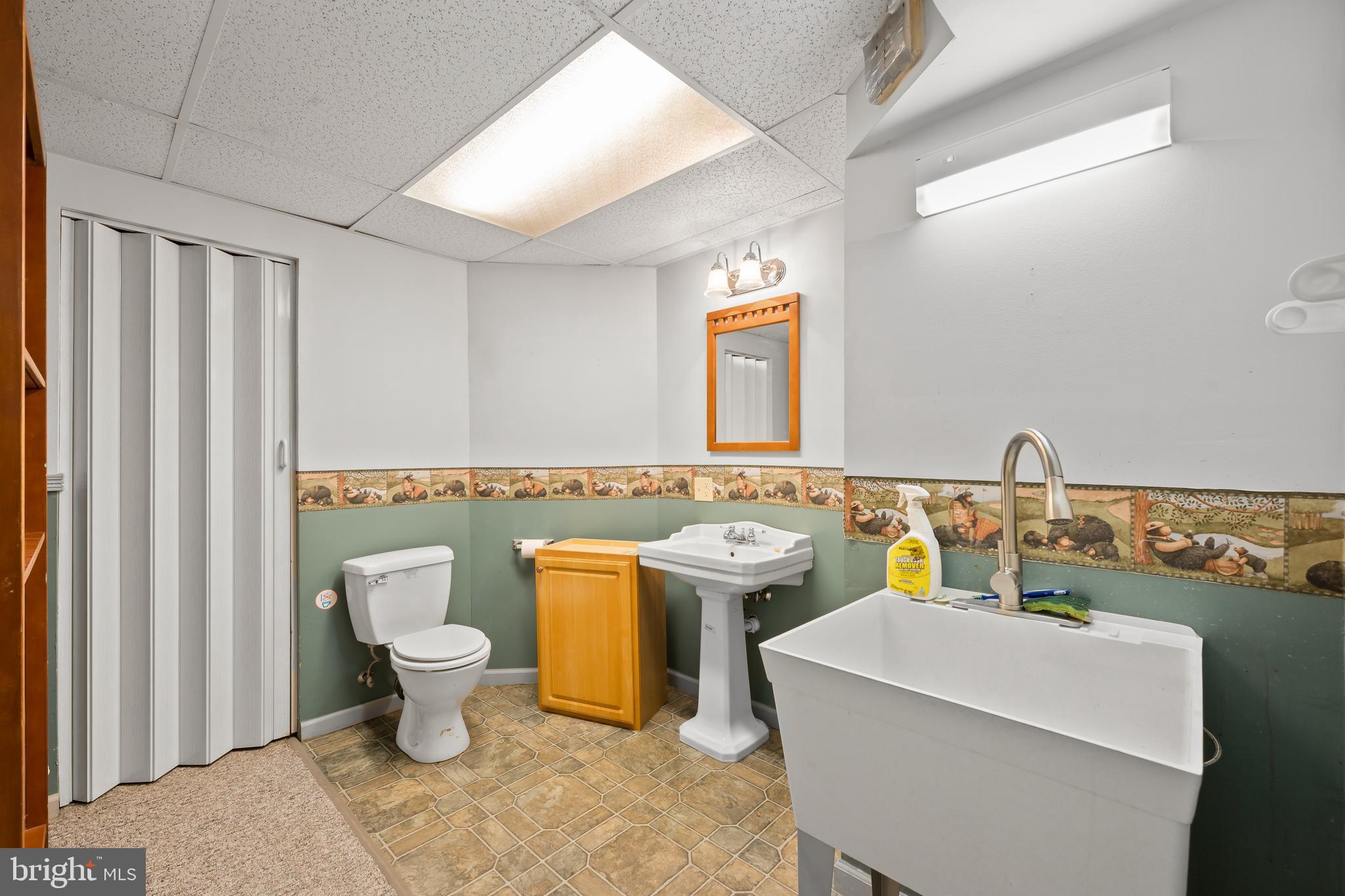 1 Pinewood Circle Hazleton, PA 18202 - Photo 32 of 33 a bathroom with a toilet sink and mirror