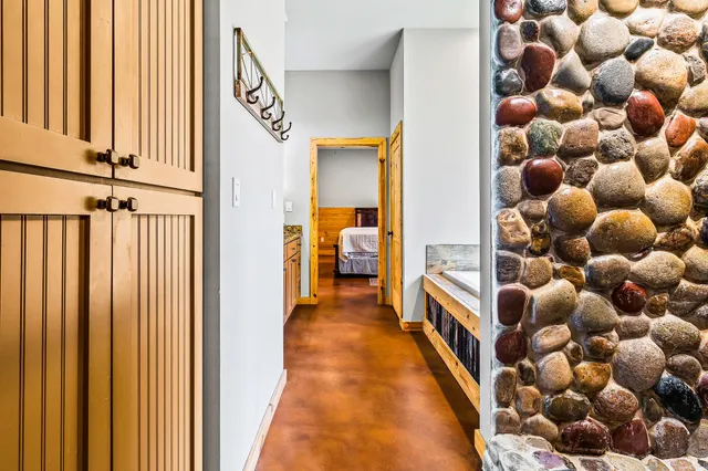 a view of a room with toys and a flat screen tv