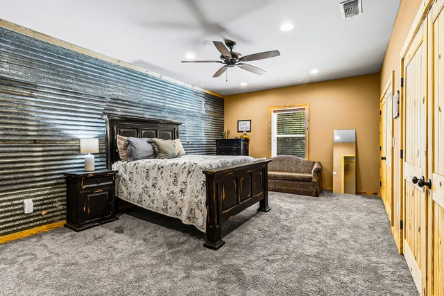 swimming pool view with a sitting space