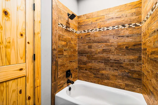 a bathroom with a toilet and a sink