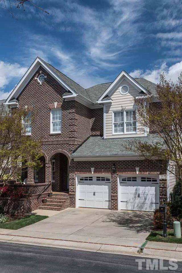 3920 Bentley Bridge Road Raleigh, NC 27612 - Photo 1 of 20 a front view of a house with a yard