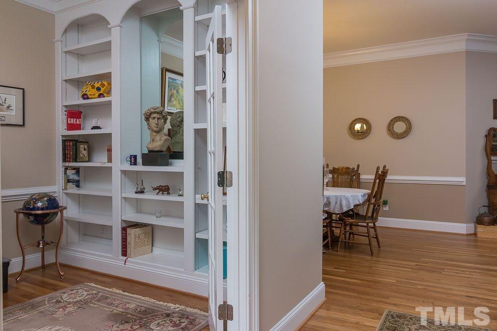 3920 Bentley Bridge Road Raleigh, NC 27612 - Photo 16 of 20 a view of dining room with wooden floor and furniture