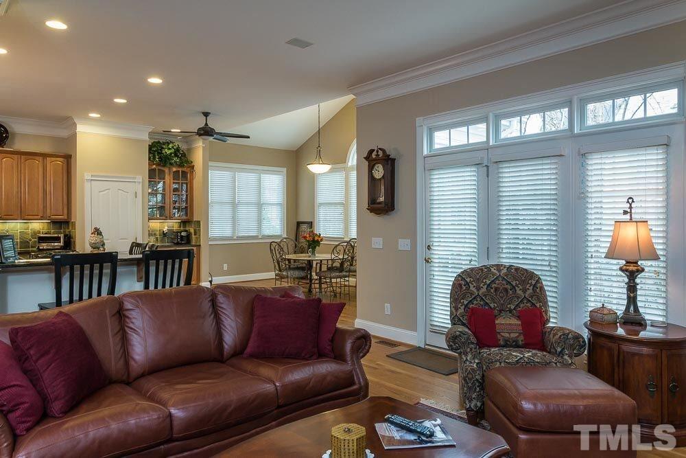 3920 Bentley Bridge Road Raleigh, NC 27612 - Photo 18 of 20 a living room with furniture and a window
