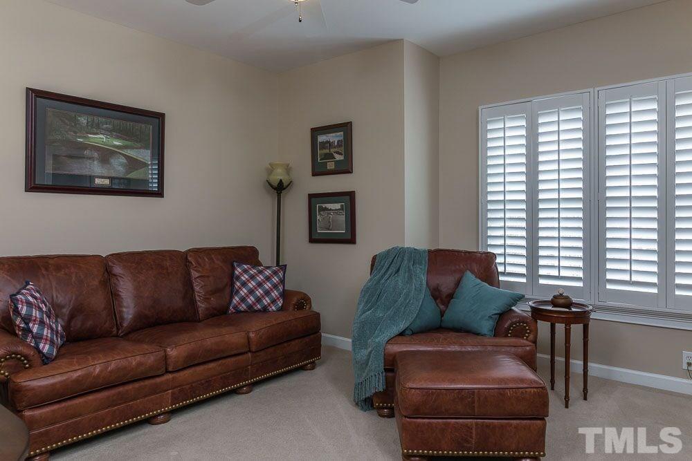 3920 Bentley Bridge Road Raleigh, NC 27612 - Photo 6 of 20 a living room with furniture and a window