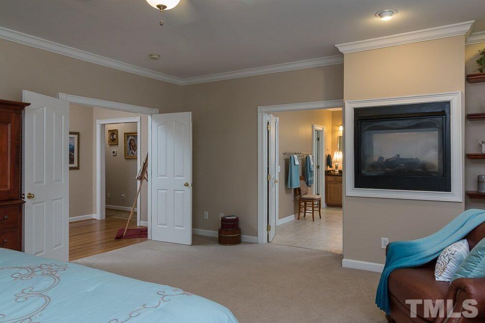 3920 Bentley Bridge Road Raleigh, NC 27612 - Photo 10 of 20 a living room with furniture