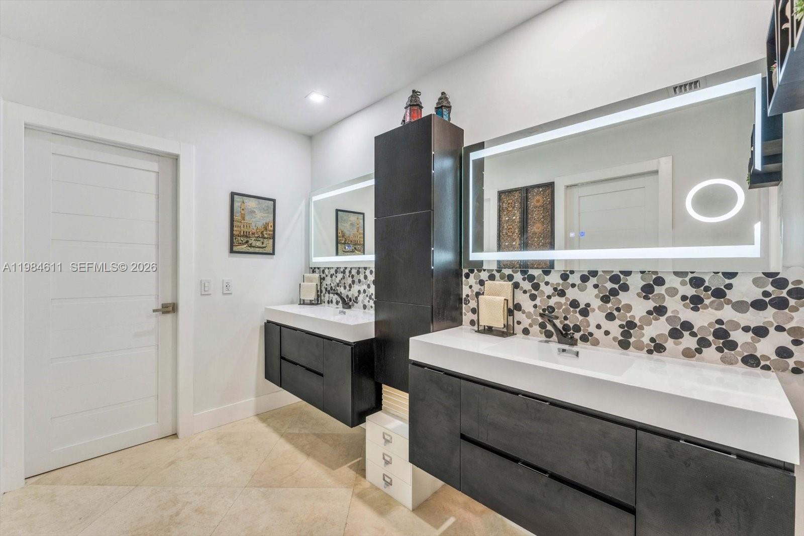 10126 Southwest 93rd Place Miami, FL 33176 - Photo 13 of 27 a bathroom with a sink and a mirror